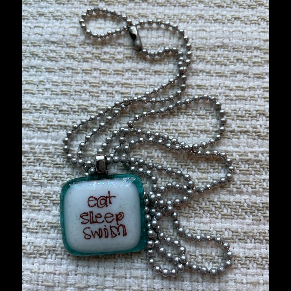 Handmade blue glass necklace tile. Eat Sleep Swim